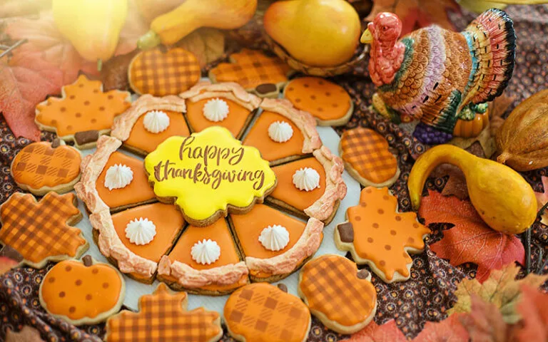Thanksgiving pie and fall leaf decorated cookies
